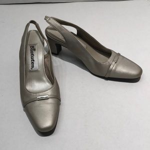Size 6 Heels Silver looking Statutes Brand  Regal